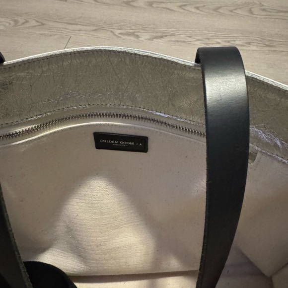 Golden Goose Silver Tote Bag for Sale
Elevate your style with this stunning bag - Picture 4 of 4